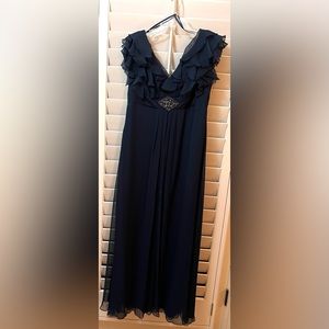 Simply elegant navy blue evening gown with beaded accent